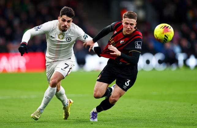 Pedro Neto of Chelsea and Adrien Truffert of AFC Bournemouth. AFC Bournemouth v Chelsea, Premier League, Football, Vitality Stadium, Bournemouth, UK - 06 Dec 2025Bournemouth Vitality Stadium United Kingdom EDITORIAL USE ONLY No use with unauthorised audio, video, data, fixture lists, club league logos or live services. Online in-match use limited to 120 images, no video emulation. No use in betting, games or single club league player publications. Copyright: xJamesxMarsh Shutterstockx 16009213an