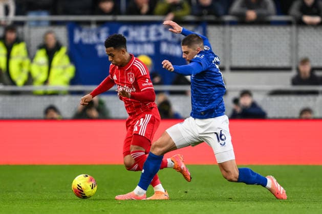 Liverpool, England, 6th December 2025. Omari Hutchinson of Nottingham Forest makes a break with the ball past Vitalii Mykolenko of Everton during the Everton vs Nottingham Forest Premier League match at Hill Dickinson Stadium, Liverpool. Picture credit should read: Craig Thomas Sportimage EDITORIAL USE ONLY. No use with unauthorised audio, video, data, fixture lists, club league logos or live services. Online in-match use limited to 120 images, no video emulation. No use in betting, games or single club league player publications. SPI_030_CT_EVERTON_V_NOTTINGHAM_FOREST SPI-4353-0030