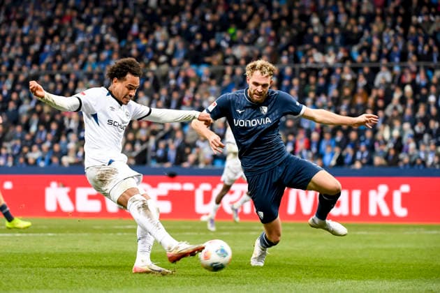 Monju Momuluh Arminia Bielefeld and Philipp Strompf VfL Bochum battle for the ball during the 2 Bundesliga match between VfL Bochum and Arminia Bielefeld, Vonovia Ruhrstadion on December 06, 2025 in Bochum, Germany Photo by Max Maiwald DeFodi Images Monju Momuluh Arminia Bielefeld and Philipp Strompf VfL Bochum battle for the ball during the 2 Bundesliga match between VfL Bochum and Arminia Bielefeld at Vonovia Ruhrstadion on December 6, 2025 in Bochum, Germany Photo by Max Maiwald DeFodi Images DFB DFL REGULATIONS PROHIBIT ANY USE OF PHOTOGRAPHS AS IMAGE SEQUENCES AND OR QUASI VIDEO Photo by Max Maiwald DeFodi Images
