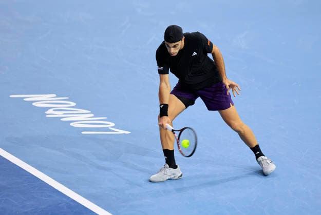 6th December 2025; Copper Box Arena, London, England; Victorian Plumbing UTS London Grand Final Tennis, Day Two; Francisco Cerundolo plays a backhand shot against Ugo Humert  HongboxChen