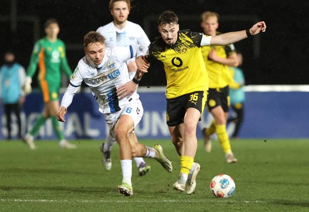 Saturday 06 12 2025, Season 2025 26, Regionalliga West, Matchday 18 at Stadion Rote Erde Dortmund, BVB Borussia Dortmund II SC Paderborn U23, Julius Burgenhagen SCP v Tony Reitz BVB II , v l