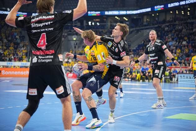 Handball scene with Maciej Gebala 77 HC Erlangen and other players Handball scene with Maciej Gebala 77 HC Erlangen Copyright: xspeedshotx