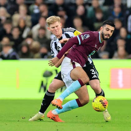 Newcastle United v Burnley Premier League Armando Broja of Burnley is tackled by Lewis Hall of Newcastle United during the Premier League match at St. James s Park, Newcastle 06 12 2025 UK Newspapers OUT Copyright: xFredxPalmerx FIL-22605-0213