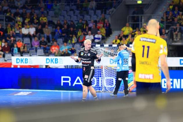Handball scene with Marek Nissen 6 HC Erlangen and a goalkeeper from Rhein Neckar Löwen Handball scene with Marek Nissen 6 HC Erlangen Copyright: xspeedshotx