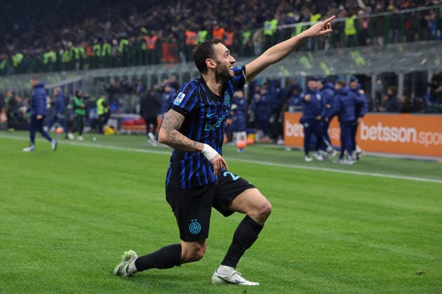 Milan, Italy, 6th December 2025. Hakan Calhanoglu of FC Internazionale celebrates after scoring to give the hosts a 3-0 lead during the Internazionale vs Como 1907 Serie A match at Giuseppe Meazza, Milan. Picture credit should read: Jonathan Moscrop Sportimage EDITORIAL USE ONLY. No use with unauthorised audio, video, data, fixture lists, club league logos or live services. Online in-match use limited to 120 images, no video emulation. No use in betting, games or single club league player publications. SPI_094_JM_INTER_COMO SPI-4322-0094