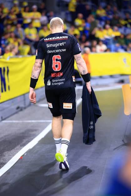 Marek Nissen 6 HC Erlangen stands on the sidelines Marek Nissen 6 HC Erlangen stands on the sidelines Copyright: xspeedshotx