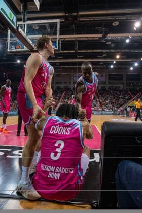 Scene with Zachery Cooks 3 Telekom Baskets Bonn , Jeff Garrett Jr 4 Telekom Baskets Bonn and Kur Jongkuch 15 Telekom Baskets Bonn on the sidelines Scene with Zachery Cooks 3 Telekom Baskets Bonn and teammates Copyright: xFeyzullahxGökalpx