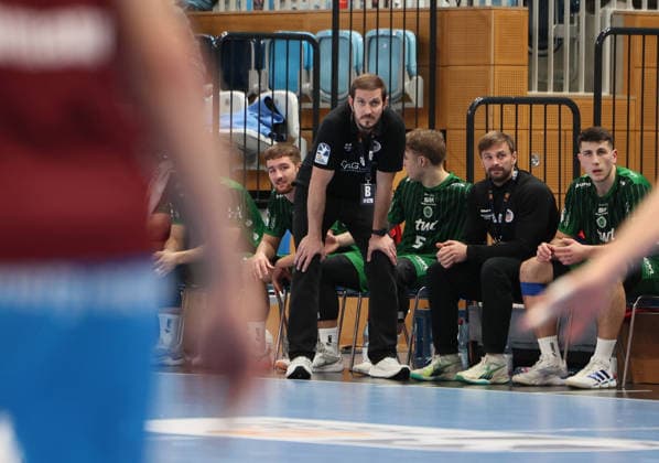 GER HBL2 Season 2025 2026 VfL Potsdam vs EULEN Ludwigshafen, 06 12 25, MBS Arena, Potsdam Michael HAAS Eulen Ludwigshafen coach observes the action on the court with focus