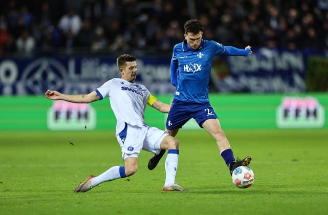 06 12 2025, Soccer 2 Bundesliga, SV Darmstadt 98 Karlsruher SC, emonline, emspor, despor, v l , Marvin Wanitzek Karlsruher SC , Sergio Lopez SV Darmstadt 98 DFL DFB REGULATIONS PROHIBIT ANY USE OF PHOTOGRAPHS AS IMAGE SEQUENCES AND OR QUASI VIDEO xdcx Copyright: HMBxMedia Claus