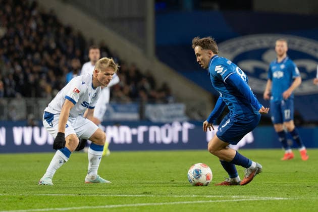 06 12 2025, xhfmx, Soccer 2 Bundesliga, SV Darmstadt 98 Karlsruher SC v l Andreas Müller Karlsruher SC defends against Luca Marseiler SV Darmstadt 98 DFL DFB REGULATIONS PROHIBIT ANY USE OF PHOTOGRAPHS as IMAGE SEQUENCES and or QUASI VIDEO Darmstadt
