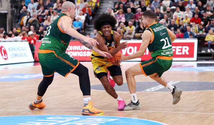 BAU 06 12 2025 Ludwigsburg Basketball MHP Riesen Ludwigsburg vs Gladiators Trier, f l Maik Zirbes Trier , Stefan Smith LB , Evans Rapieque Trier