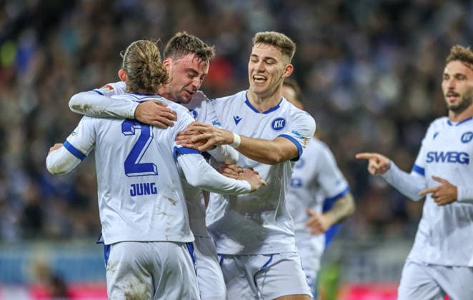 GER, Darmstadt, SV Darmstadt 98 vs Karlsruher SC, 2 Bundesliga, Football, DFB, Season 2025 2026, Merck Stadion am Böllenfalltor, 15 Matchday in picture Karlsruher SC celebrating after Matej Maglicas own goal SV Darmstadt 98 5 , Philipp Förster Karlsruher SC 11 , Sebastian Jung Karlsruher SC 2 , 0 1 DFB DFL REGULATIONS PROHIBIT ANY USE OF PHOTOGRAPHS AS IMAGE SEQUENCES AND OR QUASI VIDEO, 06 12 2025 Copyright: HMBxMedia HendrikxHamelau
