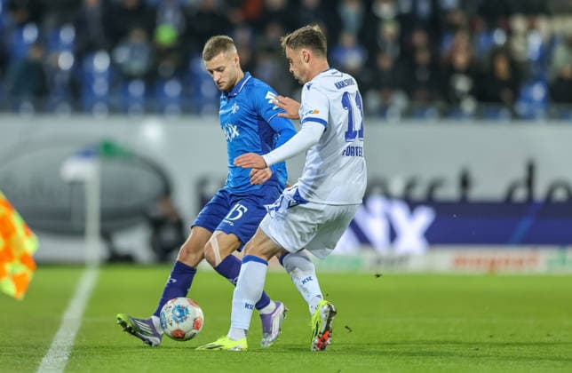 GER, Darmstadt, SV Darmstadt 98 vs Karlsruher SC, 2 Bundesliga, Football, DFB, Season 2025 2026, Merck Stadion am Böllenfalltor, 15 Matchday in the picture from l Fabian Nürnberger SV Darmstadt 98 15 , Philipp Förster Karlsruher SC 11 , Duel DFB DFL REGULATIONS PROHIBIT ANY USE OF PHOTOGRAPHS AS IMAGE SEQUENCES AND OR QUASI VIDEO, 06 12 2025 Copyright: HMBxMedia HendrikxHamelau