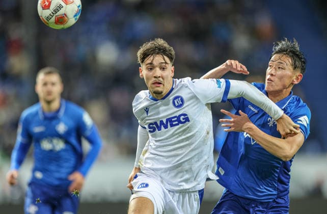 GER, Darmstadt, SV Darmstadt 98 vs Karlsruher SC, 2 Bundesliga, Football, DFB, Season 2025 2026, Merck Stadion am Böllenfalltor, 15 Matchday in the picture from l Rafael Pinto Pedrosa Karlsruher SC 36 , Hiroki Akiyama SV Darmstadt 98 , duel DFB DFL REGULATIONS PROHIBIT ANY USE OF PHOTOGRAPHS AS IMAGE SEQUENCES AND OR QUASI VIDEO, 06 12 2025 Copyright: HMBxMedia HendrikxHamelau