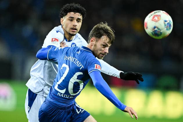 Eymen Laghrissi Karlsruher SC, 44 in duel with Matthias Bader SV Darmstadt 1898, 26 , GER, SV Darmstadt 98 vs Karlsruher SC, Soccer, 2 Bundesliga, Matchday 15, Season 2025 2026, 06 12 2025 DFL REGULATES PROHIBIT ANY USE OF PHOTOGRAPHS AS IMAGE SEQUENCES AND OR QUASI VIDEO GER, SV Darmstadt 98 vs Karlsruher SC, Football, 2 Bundesliga, Matchday 15, Season 2025 2026, 06 12 2025 Darmstadt Copyright: xEibner-Pressefoto FlorianxWiegandx EP_FWD