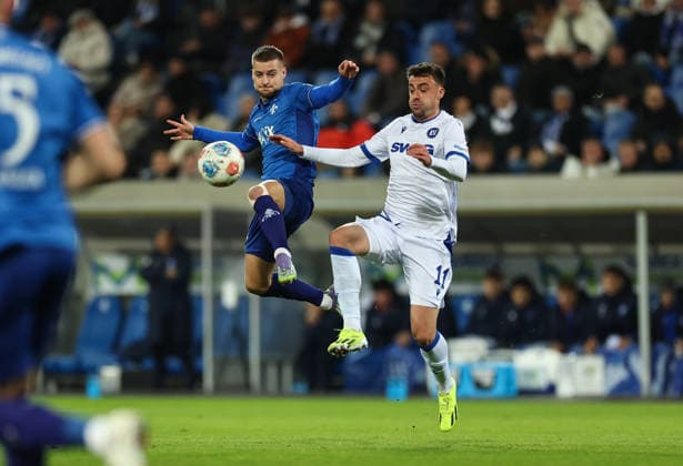 06 12 2025, Soccer 2 Bundesliga, SV Darmstadt 98 Karlsruher SC, emonline, emspor, despor, v l , Fabian Nürnberger SV Darmstadt 98 , Philipp Förster Karlsruher SC DFL DFB REGULATIONS PROHIBIT ANY USE OF PHOTOGRAPHS AS IMAGE SEQUENCES AND OR QUASI VIDEO xdcx Copyright: HMBxMedia Claus