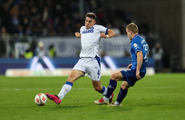 06 12 2025, Soccer 2 Bundesliga, SV Darmstadt 98 Karlsruher SC, emonline, emspor, despor, v l , Marcel Beifus Karlsruher SC , Fabian Holland SV Darmstadt 98 DFL DFB REGULATIONS PROHIBIT ANY USE OF PHOTOGRAPHS AS IMAGE SEQUENCES AND OR QUASI VIDEO xdcx Copyright: HMBxMedia Claus