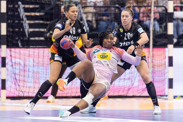 Spain Germany, IHF Womens Handball World Championship Lyndie Tchaptchet Defo Spain, 68 is tackled to the ground by Aimee von Pereira Germany, 49 and Emily Vogel Germany, 20 at the circle 3 Main Round match of the Womens Handball World Championship between Spain and Germany on December 6, 2025 at Westfalenhalle in Dortmund , Dortmund Nordrhein Westfalen Germany Westfalenhalle