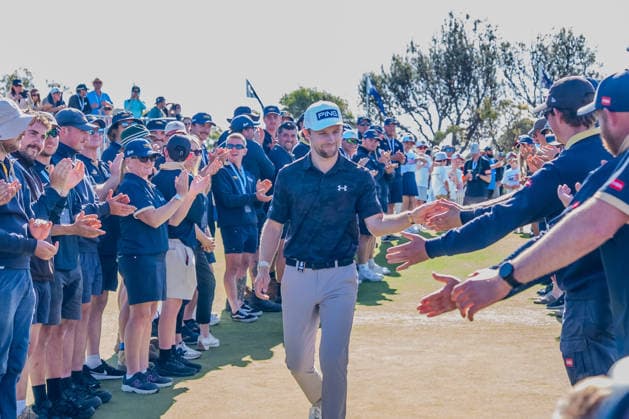 December 7, 2025, Melbourne, Victoria, Australia: Rasmus Neergaard-Petersen of Denmark is congratulated as he walks onto th 18th hole to accept his trophy after winning the 2025 Crown Australian Open at The Royal Melbourne Golf Club in Melbourne, Victoria, Australia. Melbourne Australia - ZUMAl303 20251207_aaf_l303_056 Copyright: xSydneyxLowx