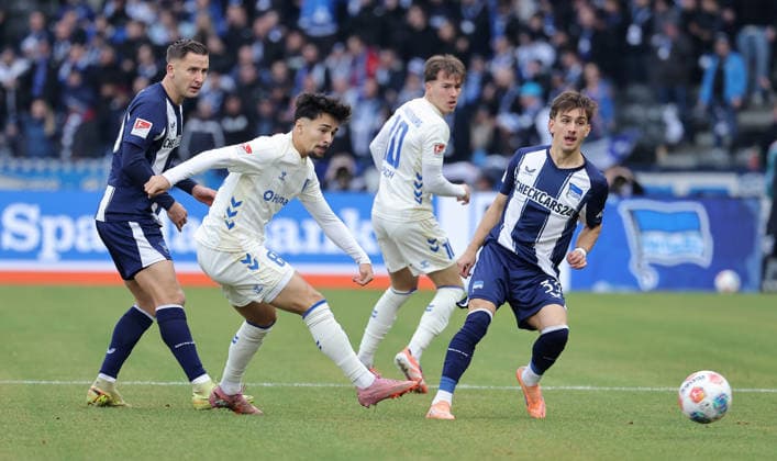 Paul Seguin, Laurin Ulrich, Michal Karbownik duel match scene Action Sport Soccer Football DFL 2 Bundesliga Men 15 Matchday Season 2025 2026 07 12 2025 Hertha BSC Berlin vs 1 FC Magdeburg FCM DFL regulations prohibit any use of photographs as image sequences and or quasi video