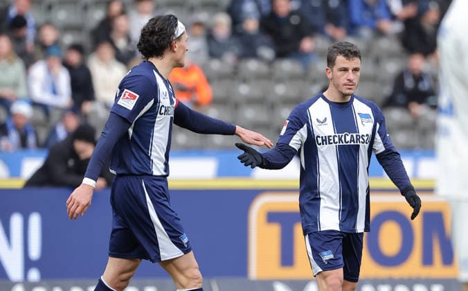 Fabian Reese high-fives with Diego Demme Action upper body Sport Football Soccer DFL 2 Bundesliga Men 15 Matchday Season 2025 2026 07 12 2025 Hertha BSC Berlin vs 1 FC Magdeburg FCM DFL regulations prohibit any use of photographs as image sequences and or quasi video