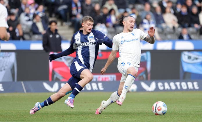 Michael Cuisance, Baris Atik on the ball duel Match scene Action Sport Football Soccer DFL 2 Bundesliga Men 15 Matchday Season 2025 2026 07 12 2025 Hertha BSC Berlin vs 1 FC Magdeburg FCM DFL regulations prohibit any use of photographs as image sequences and or quasi video