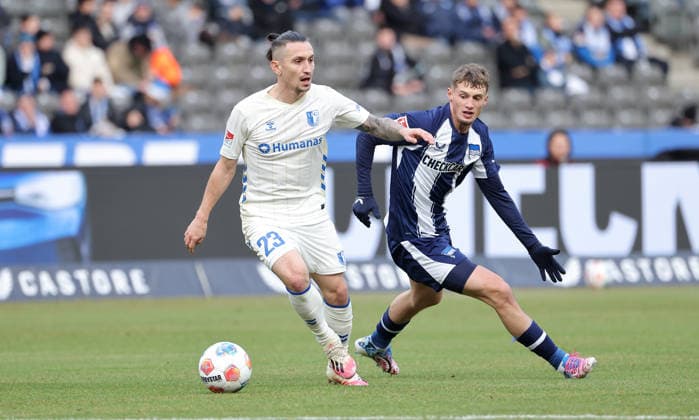 Baris Atik on the ball, Michael Cuisance duel Match scene Action Sport Football Soccer DFL 2 Bundesliga Men 15 Matchday Season 2025 2026 07 12 2025 Hertha BSC Berlin vs 1 FC Magdeburg FCM DFL regulations prohibit any use of photographs as image sequences and or quasi video