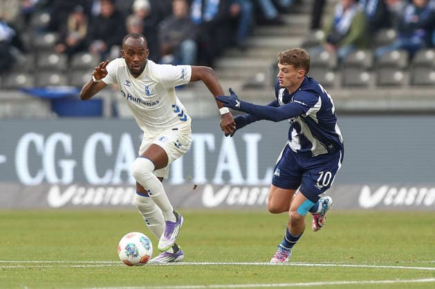 07 12 2025, xtgx, Soccer 2 Bundesliga Hertha BSC Berlin 1 FC Magdeburg emspor, v l Silas Gnaka Magdeburg, 25 , Michael Cuisance Hertha, 10 duel, duel, fight, tackle DFL DFB REGULATIONS PROHIBIT ANY USE OF PHOTOGRAPHS as IMAGE SEQUENCES and or QUASI VIDEO Berlin