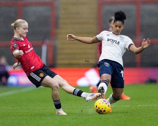 7th December 2025; Leigh Sports Village, Manchester, England; Womens Super League Football, Manchester United, ManU versus West Ham United; Anna Sandberg of Manchester United Women is tackled by Shekiera Martinez of West Ham United Women  TimxWilliams