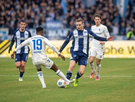 Soccer, Men, Season 2025 2026, 2 Bundesliga 15 Matchday , Hertha BSC 1 FC Magdeburg, v l Lubambo Musonda Magdeburg , Marten Winkler Hertha BSC , 07 12 2025, Copyright: xSebastianxRäppold MatthiasxKochx