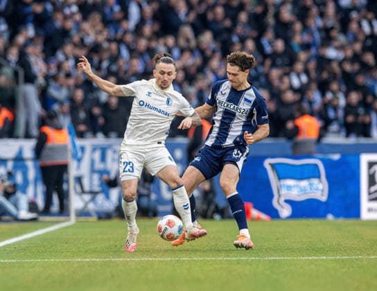 Soccer, Men, Season 2025 2026, 2 Bundesliga 15 Matchday , Hertha BSC 1 FC Magdeburg, v l Baris Atik Magdeburg , Linus Gechter Hertha BSC , 07 12 2025, Copyright: xSebastianxRäppold MatthiasxKochx