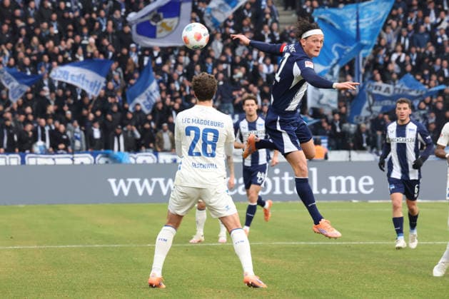 DEU, DFL, 2 FBL, Hertha BSC vs 1 FC Magdeburg, 07 12 2025, Berliner Olympiastadion, Berlin, DEU, DFL, 2 FBL, Hertha BSC vs 1 FC Magdeburg, im Bild Fabian Reese Hertha BSC Berlin 11 , Max Geschwill 1 FC Magdeburg 28 DFL regulations prohibit any use of Photographs as image sequences and or quasi video nordphotoxGmbHx xEngler nph00076