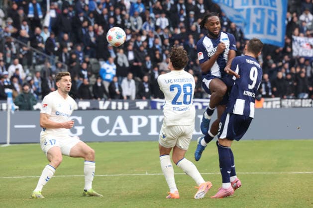 DEU, DFL, 2 FBL, Hertha BSC vs 1 FC Magdeburg, 07 12 2025, Berliner Olympiastadion, Berlin, DEU, DFL, 2 FBL, Hertha BSC vs 1 FC Magdeburg, im Bild Deyovaisio Zeefuik Hertha BSC Berlin 42 , Dawid Kownacki Hertha BSC Berlin 9 , Max Geschwill 1 FC Magdeburg 28 , Alexander Nollenberger 1 FC Magdeburg 17 DFL regulations prohibit any use of Photographs as image sequences and or quasi video nordphotoxGmbHx xEngler nph00076