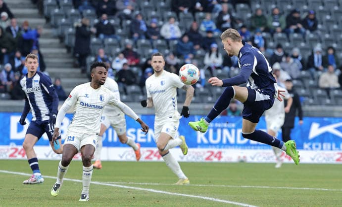 Lubambo Musonda, Philipp Hercher, Marten Winkler on the ball duel match scene action sport soccer soccer DFL 2 Bundesliga Men 15 Matchday Season 2025 2026 07 12 2025 Hertha BSC Berlin vs 1 FC Magdeburg FCM DFL regulations prohibit any use of photographs as image sequences and or quasi video