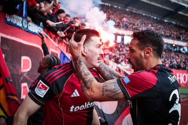 Luca Lochosvili 24 1FC Nuernberg celebrates his goal for 1 0, emotion, joy, with Adriano Grimaldi 33 1FC Nuernberg , 1 FC Nuernberg vs Spvgg Greuther Fuerth, Football, 2 Bundesliga, DFL, Season 2025 2026, Hinrunde, 15 Matchday, 07 12 2025 DFB regulations prohibit any use of photographs as image sequences and or quasi video Nuernberg Bayern Germany Copyright: xkolbert-press MartinxAgüerax