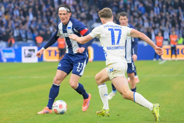 GER, Berlin, soccer, Hertha BSC vs 1 FC Magdeburg, DFB, 2nd Bundesliga, 2025 2026 season, f l t r Fabian Reese Hertha BSC , Alexander Nollenberger 1 FC Magdeburg, 17 , Action, duels, fighting for the ball, DFB DFL REGULATIONS PROHIBIT ANY USE OF PHOTOGRAPHS AS IMAGE SEQUENCES AND OR QUASI VIDEO, December 7, 2025, Copyright: HMBxMedia UwexKoch