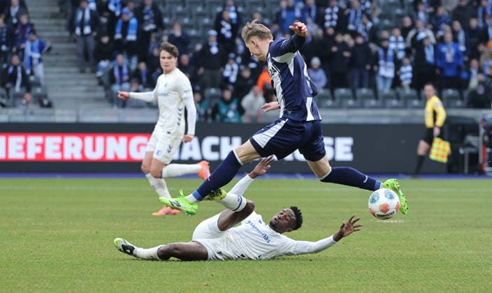 Lubambo Musonda, Marten Winkler duel match scene Action Sport Football Soccer DFL 2 Bundesliga Men 15 Matchday Season 2025 2026 07 12 2025 Hertha BSC Berlin vs 1 FC Magdeburg FCM DFL regulations prohibit any use of photographs as image sequences and or quasi video