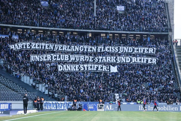 Sport, Football, 2 Bundesliga Season 2025 2026 15 Matchday Hertha BSC Berlin 1 FC Magdeburg 07 12 2025, Olympiastadion Berlin Fans 1 FC Magdeburg with a banner with the inscription Harte Zeiten verlangten Fleiss und Eifer Unser Club wurde Stark und Reifer Danke Steifer Berlin Olympiastadion Berlin Berlin Germany