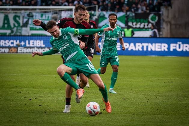 Branimir Hrgota 10 Spvgg Greuther Fuerth in action with Adam Markhiyev 6 1FC Nuernberg , 1 FC Nuernberg vs Spvgg Greuther Fuerth, Fußball, 2 Bundesliga, DFL, Saison 2025 2026, Hinrunde, 15 Spieltag, 07 12 2025 DFB regulations prohibit any use of photographs as image sequences and or quasi video Nuernberg Bayern Germany Copyright: xkolbert-press MartinxAgüerax