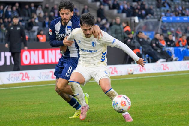 GER, Berlin, soccer, Hertha BSC vs 1 FC Magdeburg, DFB, 2nd Bundesliga, 2025 2026 season, f l t r Kevin Sessa Hertha BSC , Laurin Ulrich 1 FC Magdeburg, 08 , Action, duels, fighting for the ball, DFB DFL REGULATIONS PROHIBIT ANY USE OF PHOTOGRAPHS AS IMAGE SEQUENCES AND OR QUASI VIDEO, December 7, 2025, Copyright: HMBxMedia UwexKoch