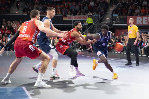 Leon Kratzer 8 Bayern , Kresimir Nikic 9 MBC and Thomas Khyri 0 MBC in action during the match Bayern Munich SYNTAINICS MBC on 07 12 2025 in Munich Munich BMW Park Bayern Germany
