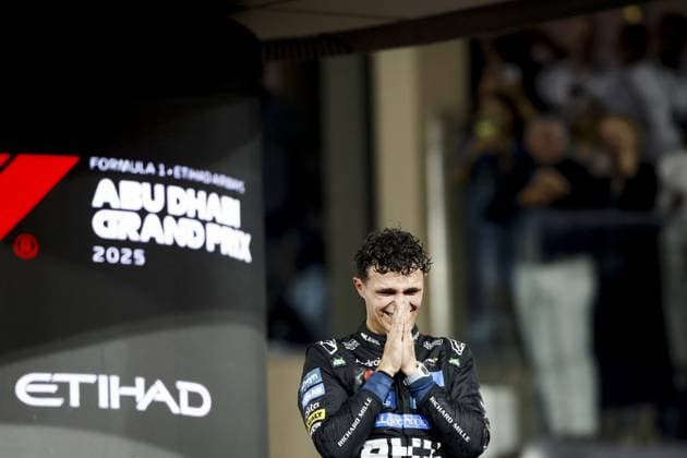 ABU DHABI Lando Norris (McLaren) celebrates his world title on the podium at the Yas Marina Circuit after the Abu Dhabi Grand Prix. ANP SANDER KONING xVIxANPxSportx xxANPxIVx 544181126 originalFilename: 544181126.jpg
