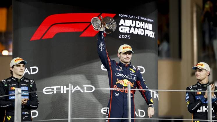 ABU DHABI Max Verstappen (Red Bull Racing) on the podium at the Yas Marina Circuit after winning the Abu Dhabi Grand Prix. Lando Norris (r) (McLaren), who finished third, took the world title. ANP SANDER KONING xVIxANPxSportx xxANPxIVx 544181780 originalFilename: 544181780.jpg