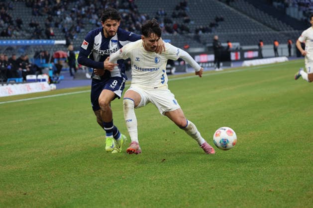 2 Soccer Bundesliga, Hertha BSC 1 FC Magdeburg Kevin Sessa Hertha BSC 8 in a duel with Laurin Ulrich FC Magdeburg, 8 , during the match in the 2 Soccer Bundesliga, Hertha BSC 1 FC Magdeburg in Berlin, Olympiastadion, on 07 12 2025 DFB regulations prohibit any use of photographs as image sequences and or quasi video Copyright: xBEAUTIFULxSPORTS Frankex