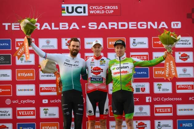 Dutch Joris Nieuwenhuis, Belgian Michael Vanthourenhout and Belgian Laurens Sweeck celebrate on the podium after the men s elite race of the Cyclocross World Cup, in Terralba, Sardinia, Italy, Sunday 07 December 2025, stage 3 (out of 12) in the World Cup of the 2026-2027 season. DAVIDxPINTENS  x147200096x