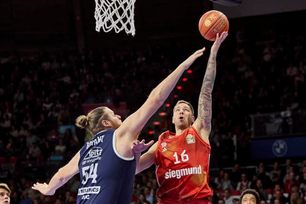 German Basketball Bundesliga BBL , FC Bayern Munich Basketball vs SYNTAINICS MBC, Munich FC Bayern Basketball, SYNTAINICS MBC, 2025 12 07 in Munich BMW Park Munich JOVIC Stefan FC Bayern Basketball PG Nr16 FCBB16 , BRYANT John SYNTAINICS MBC Center Nr 54 MBC54 sportworld Munich BMW Park Munich Bayern Germany