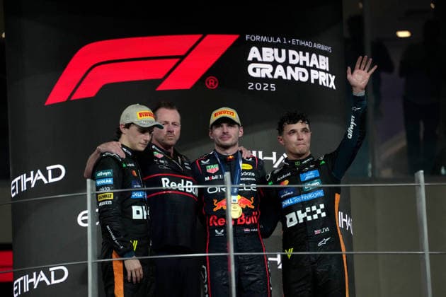Formula 1 Etihad Airways Abu Dhabi Grand Prix 2025 07 12 2025, Yas Marina Circuit, Abu Dhabi, Formula 1 Etihad Airways Abu Dhabi Grand Prix 2025 , in the picture podium , winner Max Verstappen NLD , Oracle Red Bull Racing, 2nd place for Oscar Piastri AUS , McLaren F1 Team, 3rd place and thus the new Formula 1 World Champion 2025, Lando Norris GBR , Head of Race Team Operations Richard Wolverson Red Bull Racing nordphotoxGmbHx xBratic nph00250