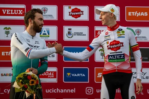 Dutch Joris Nieuwenhuis and Belgian Michael Vanthourenhout pictured on the podium after the men s elite race of the Cyclocross World Cup, in Terralba, Sardinia, Italy, Sunday 07 December 2025, stage 3 (out of 12) in the World Cup of the 2026-2027 season. DAVIDxPINTENS  x147202883x