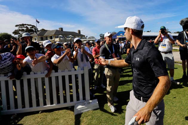 December 7, 2025, Melbourne, Australia: Rasmus Neergaard-Petersen of Denmark throws a golf ball to a fan after winning the tournament. The 2025 Australian Open concluded with Denmark™s Rasmus Neergaard-Petersen securing the championship at 15-under after a tense final round at The Australian Golf Club. The tournament delivers a dramatic finish, with top international contenders pushing the leaderboard to the final holes. Large crowds gathered across the course as fans watch one of Australia™s premier golf events come to a close for the year. Melbourne Australia - ZUMAs197 20251207_aaa_s197_089 Copyright: xYexMyoxKhantx