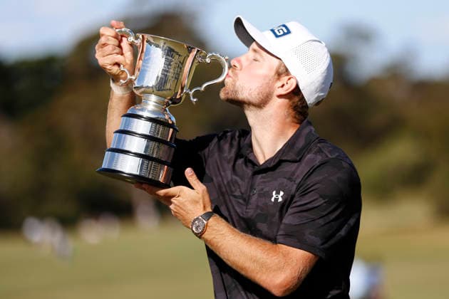 December 7, 2025, Melbourne, Australia: Rasmus Neergaard-Petersen of Denmark kisses the trophy after winning the Australian Open Golf tournament. The 2025 Australian Open concluded with Denmark™s Rasmus Neergaard-Petersen securing the championship at 15-under after a tense final round at The Australian Golf Club. The tournament delivers a dramatic finish, with top international contenders pushing the leaderboard to the final holes. Large crowds gathered across the course as fans watch one of Australia™s premier golf events come to a close for the year. Melbourne Australia - ZUMAs197 20251207_aaa_s197_090 Copyright: xYexMyoxKhantx